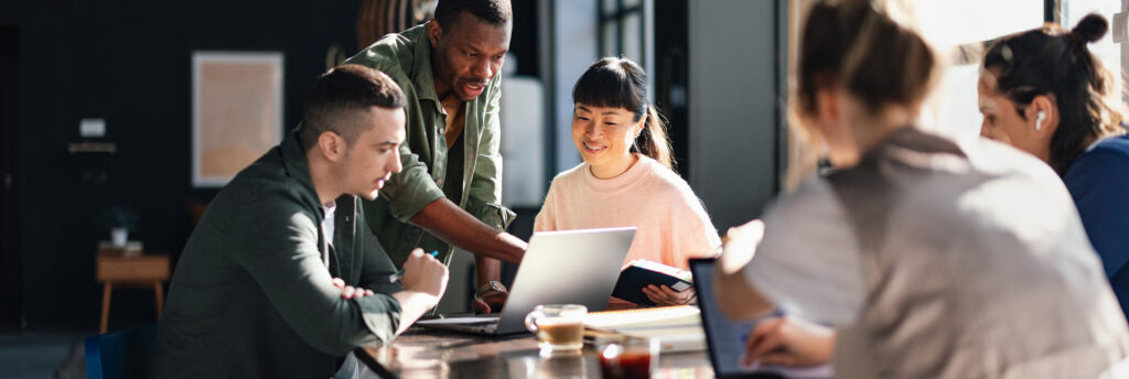 group of professionals working around a table